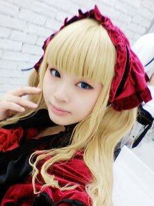 Rating: Safe Score: 0 Tags: 1girl bangs blonde_hair blue_eyes bow closed_mouth flower lips long_hair looking_at_viewer photo red_flower red_rose ribbon rose shinku solo User: admin