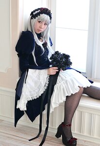 Rating: Safe Score: 0 Tags: 1girl black_footwear bouquet dress flower frills gothic_lolita hairband high_heels lolita_fashion long_hair long_sleeves looking_at_viewer pantyhose shoes silver_hair sitting solo suigintou User: admin
