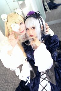 Rating: Safe Score: 0 Tags: 2girls bangs blonde_hair blue_eyes blurry depth_of_field dress eyepatch flower hairband lips lolita_fashion long_hair long_sleeves looking_at_viewer multiple_cosplay multiple_girls red_eyes sisters suigintou tagme User: admin