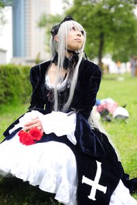 Rating: Safe Score: 0 Tags: 1girl black_dress blurry blurry_background depth_of_field dress flower frills gothic_lolita grass long_hair long_sleeves outdoors photo rose sitting solo suigintou User: admin