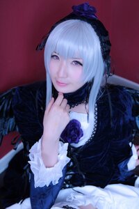 Rating: Safe Score: 0 Tags: 1girl black_dress blue_rose closed_mouth dress flower frills gothic_lolita hairband lips lolita_fashion lolita_hairband long_sleeves looking_at_viewer red_background rose silver_hair smile solo suigintou wings User: admin