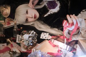 Rating: Safe Score: 0 Tags: 1girl blurry blurry_foreground card depth_of_field dress flower frills lips lolita_fashion long_hair looking_at_viewer playing_card red_lips rose solo suigintou User: admin