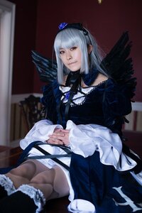 Rating: Safe Score: 0 Tags: 1girl black_wings blurry depth_of_field doll_joints dress feathered_wings feathers frills gothic_lolita hairband joints long_hair long_sleeves looking_at_viewer ribbon silver_hair sitting solo suigintou wings User: admin