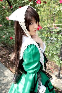 Rating: Safe Score: 0 Tags: 1girl 3d blurry brown_eyes brown_hair depth_of_field dress flower frills green_dress head_scarf lips long_hair long_sleeves looking_at_viewer outdoors solo suiseiseki User: admin
