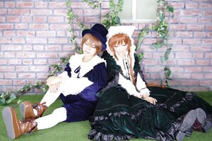 Rating: Safe Score: 0 Tags: 1boy 1girl boots brick_wall brown_hair closed_eyes dress flower hat long_hair long_sleeves multiple_cosplay pantyhose plant sitting tagme white_legwear User: admin