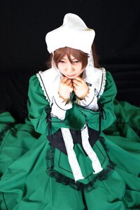 Rating: Safe Score: 0 Tags: 1girl brown_hair dress frills green_dress hat lips long_sleeves solo suiseiseki User: admin