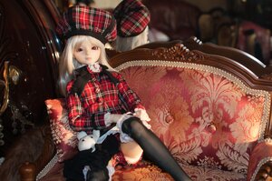 Rating: Safe Score: 0 Tags: 1girl black_legwear blonde_hair boots capelet doll gloves hat long_hair plaid plaid_scarf red_eyes sitting solo suigintou thighhighs User: admin