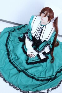 Rating: Safe Score: 0 Tags: 1girl brown_hair dress frills green_eyes heterochromia lolita_fashion long_hair long_sleeves looking_at_viewer sitting smile solo souseiseki suiseiseki User: admin