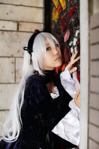 Rating: Safe Score: 0 Tags: 1girl blurry blurry_background blurry_foreground depth_of_field hairband indoors long_hair long_sleeves photo sitting solo suigintou very_long_hair white_hair User: admin