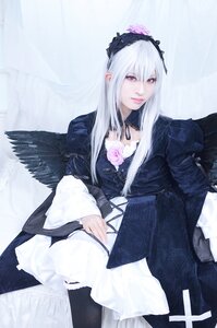 Rating: Safe Score: 0 Tags: 1girl black_wings dress flower frills gothic_lolita hairband lips lolita_fashion long_hair long_sleeves looking_at_viewer rose silver_hair sitting solo suigintou wings User: admin