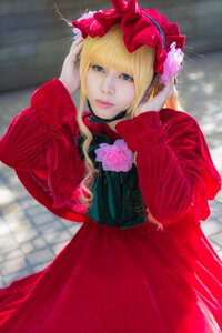 Rating: Safe Score: 0 Tags: 1girl blonde_hair blue_eyes blurry bow dress flower lips looking_at_viewer photo pink_flower pink_rose red_dress rose shinku solo User: admin