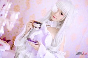 Rating: Safe Score: 0 Tags: 1girl bangs blurry blurry_background blurry_foreground depth_of_field dress eyepatch food holding kirakishou lips long_hair smile solo teacup white_dress white_hair User: admin
