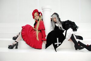 Rating: Safe Score: 0 Tags: 2girls blonde_hair dress frills long_hair long_sleeves multiple_cosplay multiple_girls red_eyes shinku silver_hair sitting suigintou tagme User: admin