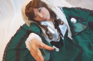 Rating: Safe Score: 0 Tags: 1girl brown_hair dress frills green_dress hat head_scarf lips lolita_fashion long_hair long_sleeves looking_at_viewer outstretched_arm pointing pointing_at_viewer solo suiseiseki upper_body User: admin
