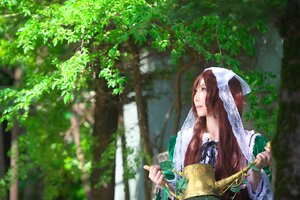 Rating: Safe Score: 0 Tags: 1girl blurry brown_hair depth_of_field dress green_dress green_eyes long_hair outdoors solo suiseiseki tree watering_can User: admin