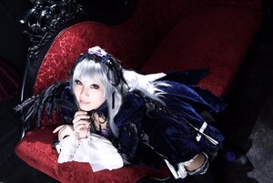 Rating: Safe Score: 0 Tags: 1girl dress flower frills hair_ornament lips long_hair looking_at_viewer lying silver_hair solo suigintou User: admin