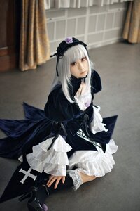 Rating: Safe Score: 0 Tags: 1girl 3d blurry breasts dress frills gothic_lolita lace lips lolita_fashion long_hair long_sleeves photo realistic sitting solo suigintou User: admin