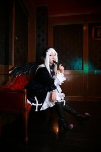 Rating: Safe Score: 0 Tags: 1girl black_wings boots chair dress flower frills long_hair long_sleeves sitting solo suigintou white_hair wings User: admin