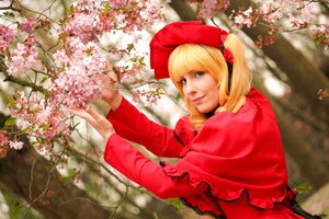 Rating: Safe Score: 0 Tags: 1girl blonde_hair blue_eyes capelet cherry_blossoms dress flower hat lips long_sleeves looking_at_viewer nose realistic shinku solo User: admin