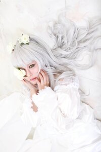 Rating: Safe Score: 0 Tags: 1girl blurry depth_of_field flower hair_flower hair_ornament lips long_hair long_sleeves solo striped vertical_stripes white_flower white_hair white_theme User: admin