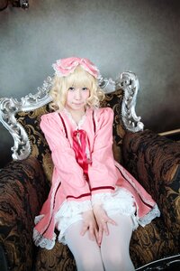 Rating: Safe Score: 0 Tags: 1girl blonde_hair blue_eyes chair dress frills hinaichigo lips long_sleeves looking_at_viewer pink_dress ribbon sitting solo User: admin