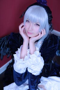 Rating: Safe Score: 0 Tags: 1girl bangs black_dress blurry closed_mouth depth_of_field dress frilled_sleeves frills gothic_lolita hairband lips lolita_fashion long_sleeves looking_at_viewer sitting solo suigintou User: admin