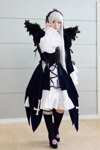 Rating: Safe Score: 0 Tags: 1girl auto_tagged black_legwear boots dress frills full_body hairband long_hair long_sleeves looking_at_viewer photo solo standing suigintou thighhighs wings User: admin