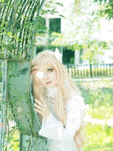 Rating: Safe Score: 0 Tags: 1girl blonde_hair blurry depth_of_field flower green_eyes kirakishou lips long_hair looking_at_viewer plant solo upper_body white_dress User: admin