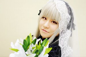 Rating: Safe Score: 0 Tags: 1girl bangs blunt_bangs bow closed_mouth eyelashes face flower lace lips looking_at_viewer portrait red_eyes solo striped suigintou veil white_flower white_hair User: admin
