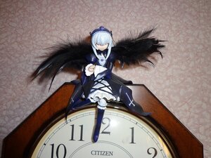 Rating: Safe Score: 0 Tags: 1girl black_wings boots doll dress feathered_wings feathers frills hair_over_eyes hat long_hair long_sleeves silver_hair sitting solo suigintou white_hair wings User: admin