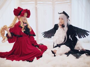 Rating: Safe Score: 0 Tags: 2girls bangs blonde_hair bonnet curtains dress feathers flower indoors long_hair long_sleeves looking_at_another multiple_cosplay multiple_girls red_dress shinku sitting suigintou tagme window User: admin