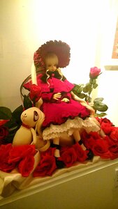 Rating: Safe Score: 0 Tags: 1girl blonde_hair doll dress flower hat red_flower red_rose rose shinku solo stuffed_animal User: admin