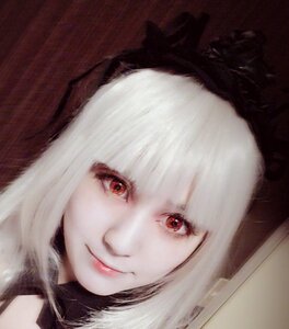 Rating: Safe Score: 0 Tags: 1girl bangs closed_mouth face fur_trim hood hood_up lips looking_at_viewer portrait red_eyes smile solo suigintou white_hair User: admin