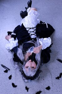 Rating: Safe Score: 0 Tags: 1girl black_feathers black_footwear dress feathers flower frilled_sleeves frills gothic_lolita hairband lolita_fashion long_hair long_sleeves looking_at_viewer rose silver_hair solo suigintou User: admin