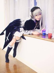 Rating: Safe Score: 0 Tags: 1girl black_wings frills hairband long_hair long_sleeves silver_hair solo suigintou wings User: admin