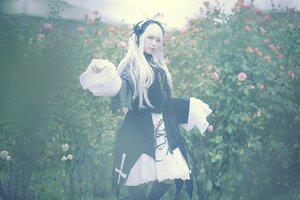 Rating: Safe Score: 0 Tags: 1girl bangs black_dress blonde_hair dress flower holding long_hair long_sleeves outdoors solo standing suigintou User: admin