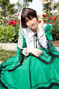 Rating: Safe Score: 0 Tags: 1girl brown_hair chain dress flower green_dress long_sleeves smile solo suiseiseki User: admin