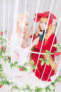 Rating: Safe Score: 0 Tags: 2girls bangs blonde_hair blue_eyes dress flower long_hair multiple_cosplay multiple_girls red_dress rose shinku solo tagme User: admin