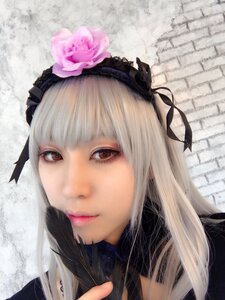 Rating: Safe Score: 0 Tags: 1girl bangs closed_mouth flower hair_ornament hairband lips long_hair looking_at_viewer portrait red_eyes ribbon solo suigintou User: admin