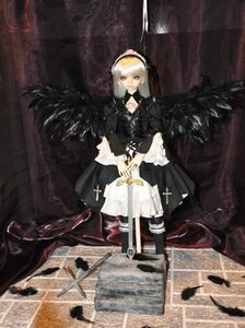 Rating: Safe Score: 0 Tags: 1girl black_wings blonde_hair doll dress feathers frills hairband long_hair solo suigintou wings User: admin