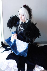 Rating: Safe Score: 0 Tags: 1girl closed_mouth dress frills fur_trim gothic_lolita hairband lolita_fashion lolita_hairband long_sleeves solo standing suigintou white_hair User: admin