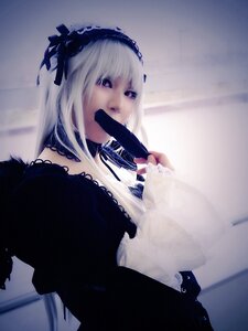 Rating: Safe Score: 0 Tags: 1girl 3d dress frills hairband long_hair long_sleeves photo purple_eyes solo suigintou User: admin