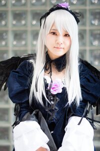 Rating: Safe Score: 0 Tags: 1girl blurry blurry_background depth_of_field dress feathers flower gothic_lolita hairband indoors lolita_fashion long_hair long_sleeves looking_at_viewer photo rose smile solo suigintou upper_body wings User: admin