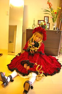 Rating: Safe Score: 0 Tags: 1girl auto_tagged blonde_hair bonnet dress flower frills long_hair red_dress shinku sitting solo User: admin