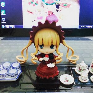 Rating: Safe Score: 0 Tags: 1girl blonde_hair blue_eyes bonnet chibi cup doll dress frills long_hair looking_at_viewer photo shinku sitting solo teacup twintails User: admin