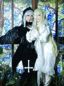 Rating: Safe Score: 0 Tags: 2girls black_dress blonde_hair dress flower frills hairband long_hair long_sleeves looking_at_viewer multiple_cosplay multiple_girls plant stained_glass standing suigintou tagme wings User: admin