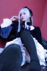 Rating: Safe Score: 0 Tags: 1girl bangs black_legwear choker closed_eyes dress frills gothic_lolita hairband lolita_fashion long_hair long_sleeves sitting solo suigintou thighhighs User: admin