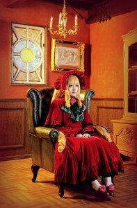 Rating: Safe Score: 0 Tags: 1girl blonde_hair blue_eyes bow chair dress flower long_hair painting_(object) red_dress rose shinku sitting solo User: admin