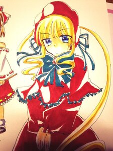 Rating: Safe Score: 0 Tags: 1girl blonde_hair blue_eyes bonnet bow capelet dress frills hat image long_hair long_sleeves looking_at_viewer shinku sidelocks solo traditional_media User: admin