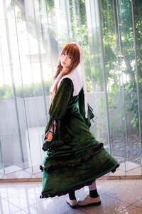 Rating: Safe Score: 0 Tags: 1girl braid brown_eyes brown_hair day dress green_dress long_hair looking_at_viewer outdoors solo standing suiseiseki twin_braids User: admin